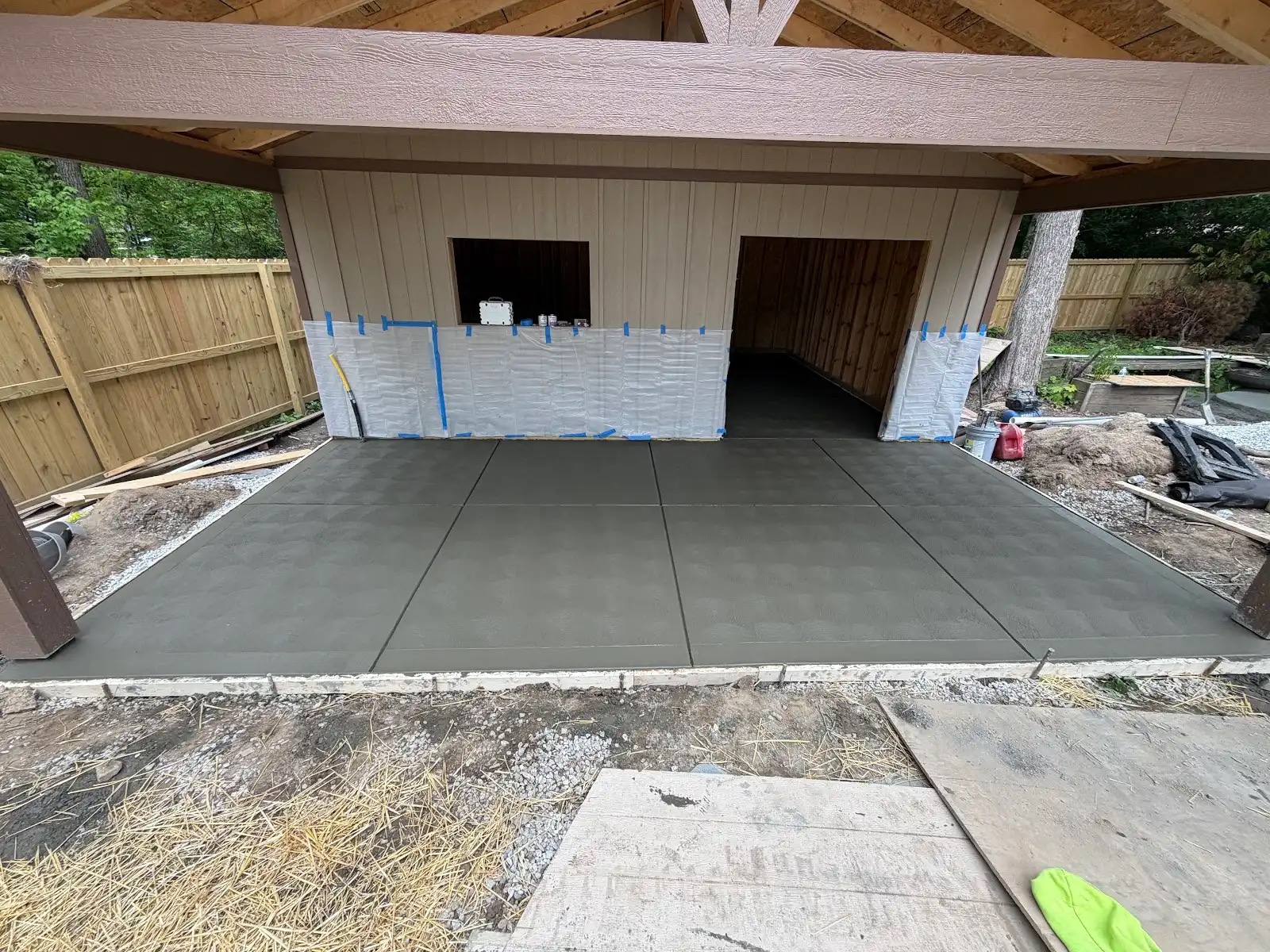 Concrete slab under covered structure